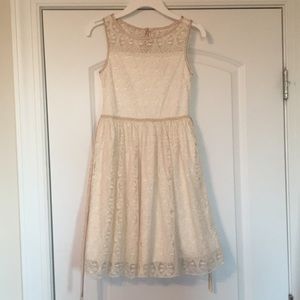 Golden/ cream dress with pearled belt.